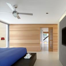 Contemporary Bedroom With Horizontal Natural Wood Paneling