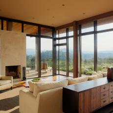 Neutral Living Room With Floor-to-Ceiling Windows and Mountain View