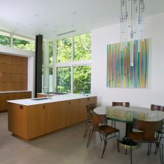 Modern White Kitchen With Glass-Rod Chandelier