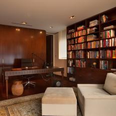 Traditional Library With Floor-to-Ceiling Bookshelves
