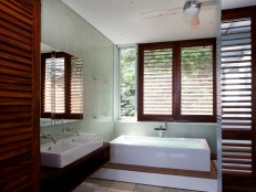 Contemporary Bathroom With Wood Shutters