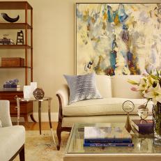 Contemporary Living Room With Neutral Walls and Large Artwork