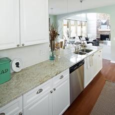 Mint and White Kitchen With Granite Countertops