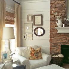 Cottage Living Room With Eclectic Wall Collage
