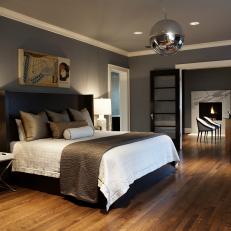 Gray Master Bedroom With Mirrored Ball Light