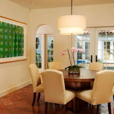Neutral Dining Room With Green Artwork