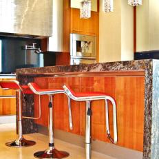 Modern Kitchen With Red Bar Stools