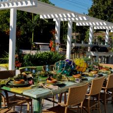 Nautical Outdoor Dining Space With Pergola