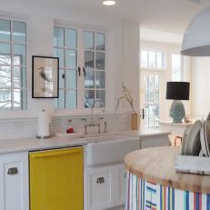 Bright Yellow Dishwasher Adds Color to White Kitchen