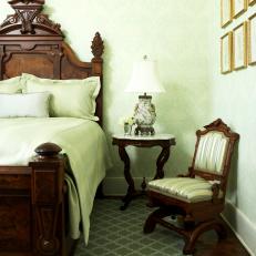 Traditional Bedroom With Subtle Patterned Green Wallpaper