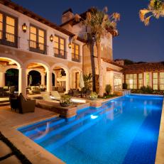 Resort-Style Mediterranean Patio with Arcade and Pool