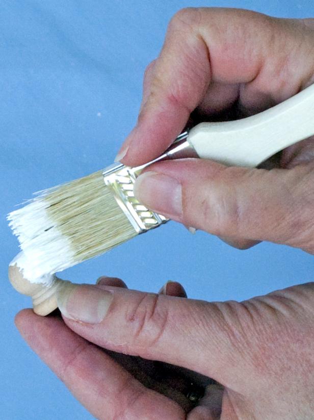 Paint the spools, finials and trim pieces white with the same paint and the smaller brush (Images 2-4). Let dry. Re-coat as necessary.