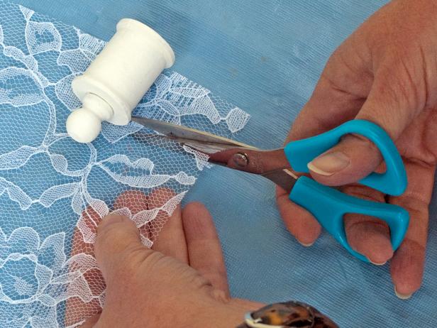 Cut a piece of lace to fit around the spool and decoupage it on, painting craft glue all the way around (Images 2-3).
