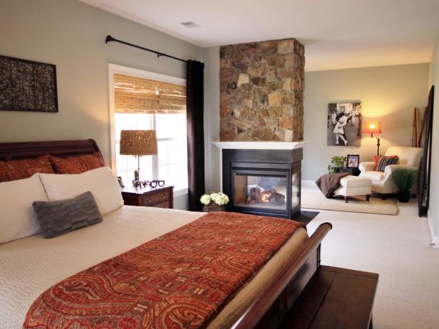 Master Bedroom With Stone Fireplace And Sitting Room Hgtv