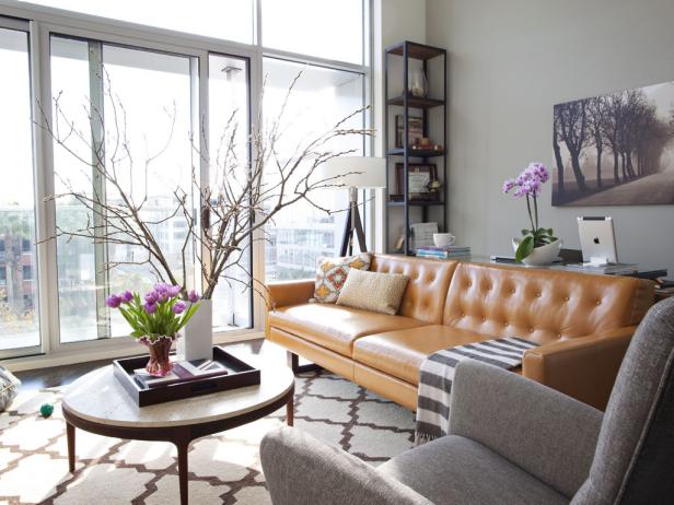 Sitting Room With Glass Sliding Doors and Muted Orange Leather Couch