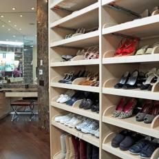 Contemporary Walk-In Closet With Angled Shoe Display