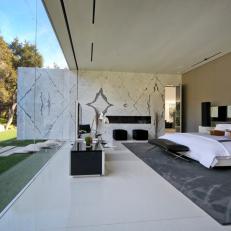 Modern Master Bedroom With Book-Matched Marble Wall