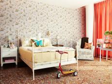 Patterned Kid's Bedroom With Orange Curtains