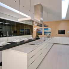 Modern Kitchen With Breakfast Bar & White Marble Countertops