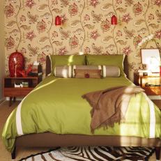 Transitional Bedroom With Floral Wallpaper and Red Accents