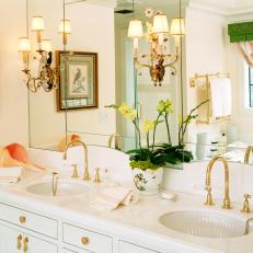 Victorian-Inspired Pale Pink Bathroom With Gold Accents
