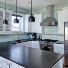 Contemporary Kitchen With Aqua-Blue Tile Backsplash and White Cabinetry