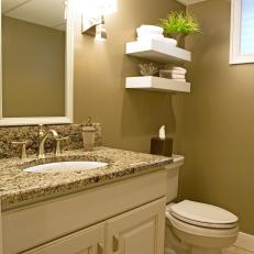 Small Brown Bathroom Packed With Style