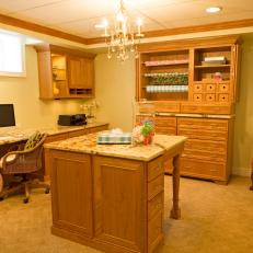 Traditional Neutral Craft Room With Wood Cabinetry