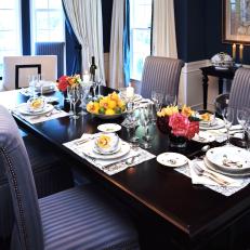 Dramatic Dining Room in Deep Cobalt Blue With Ivory Drapes