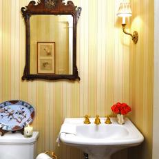 Traditional Powder Room With Striped Yellow Wallpaper