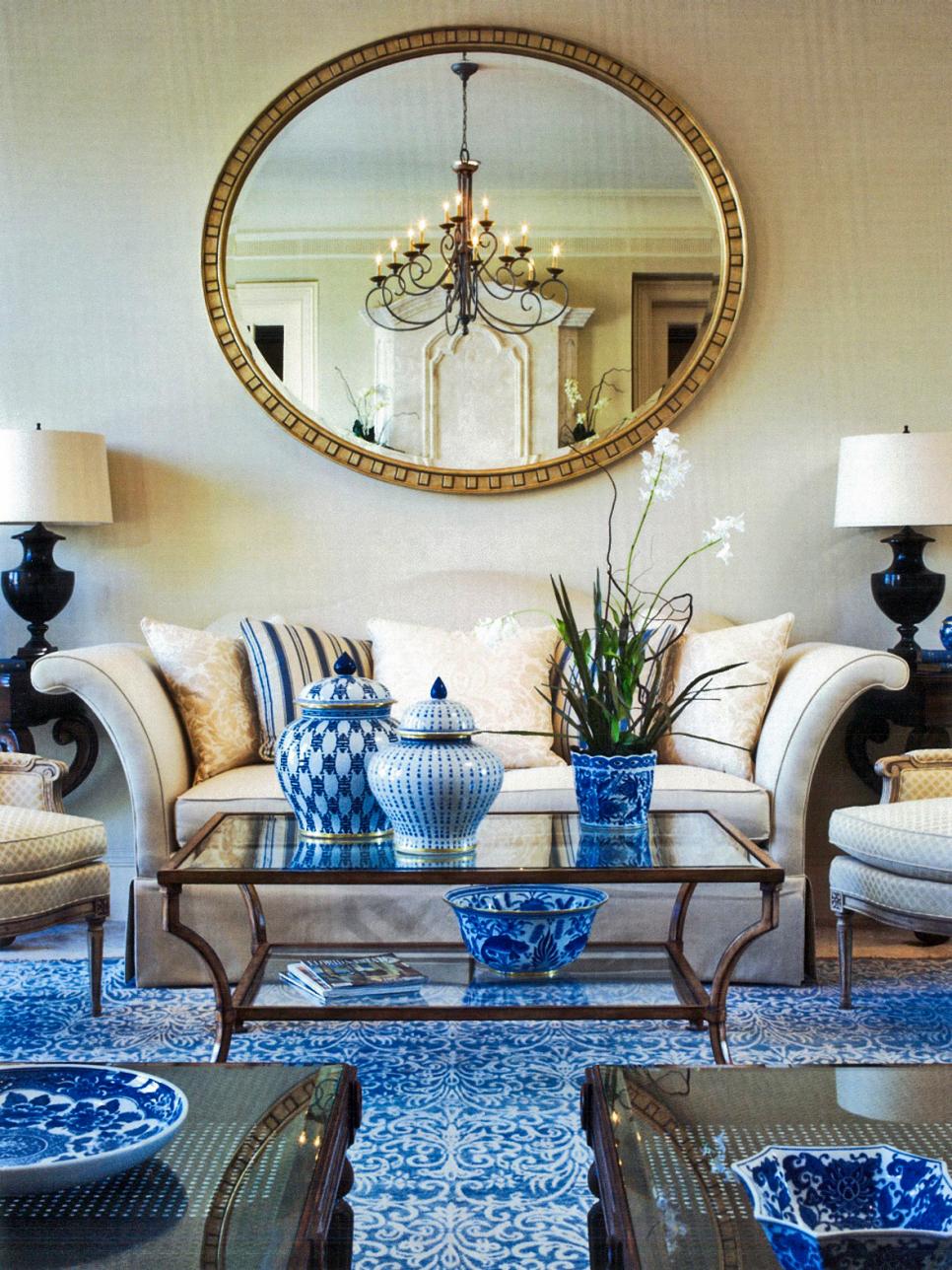 Blue Living Room With Large Round Mirror HGTV