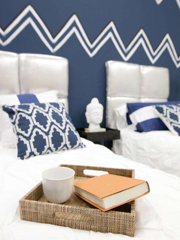 Neural Tray With Coffee Mug and Book on Bed in Navy Bed Room