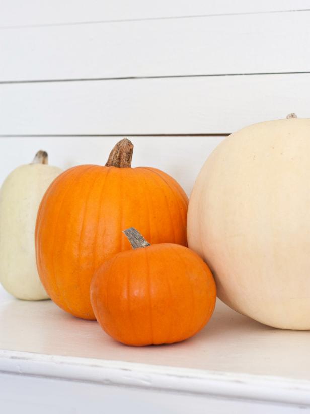Four multi-colored pumpkins