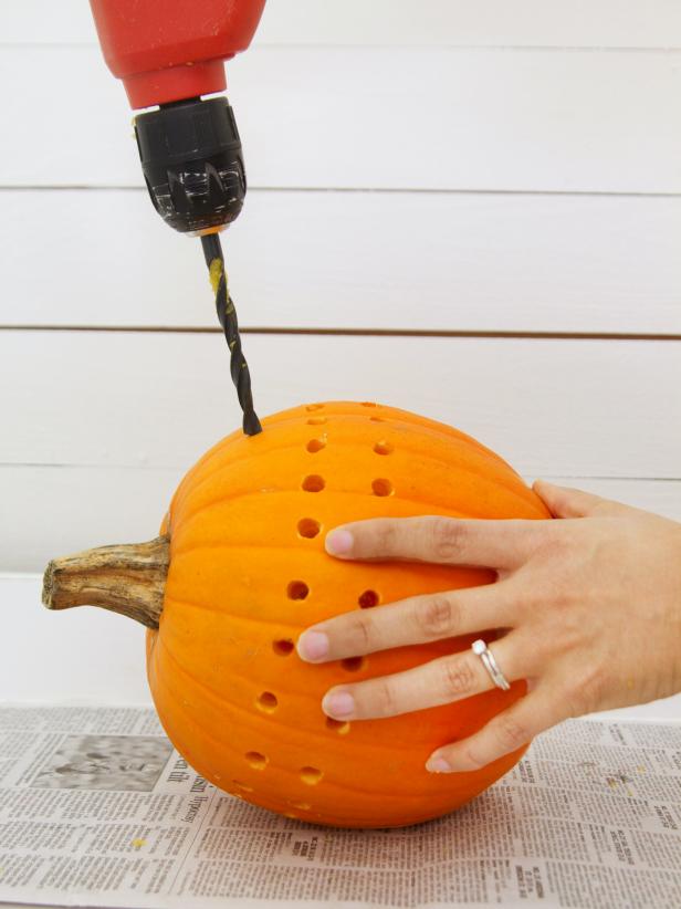 Drilling holes in the pumpkin will allow candlelight to shine through.