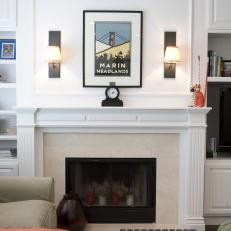 Simple Living Room Fireplace Showcasing Art