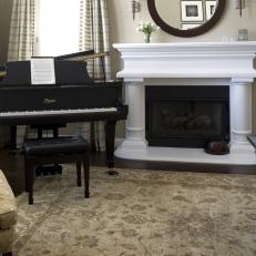 Traditional Neutral Living Room With Piano and Fireplace