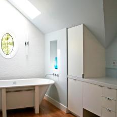 Modern Attic Bathroom With Freestanding Bathtub