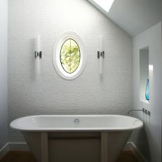 Clean, White Modern Bathroom With Freestanding Bathtub