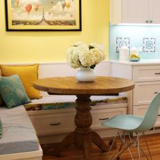Yellow Breakfast Nook With Banquette Seating