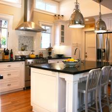Transitional Kitchen With Industrial Pendants Over Island
