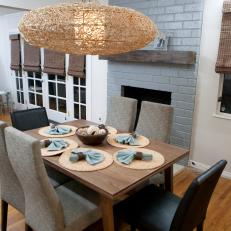 Transitional Dining Room With Gray Brick Fireplace