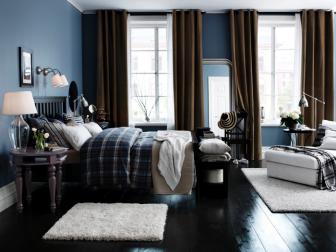Dark Blue Bedroom With Brown Curtains, Plaid Bedding and White Rugs