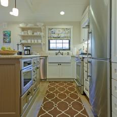 Coastal Kitchen With Apron Front Sink and Patterned Rug