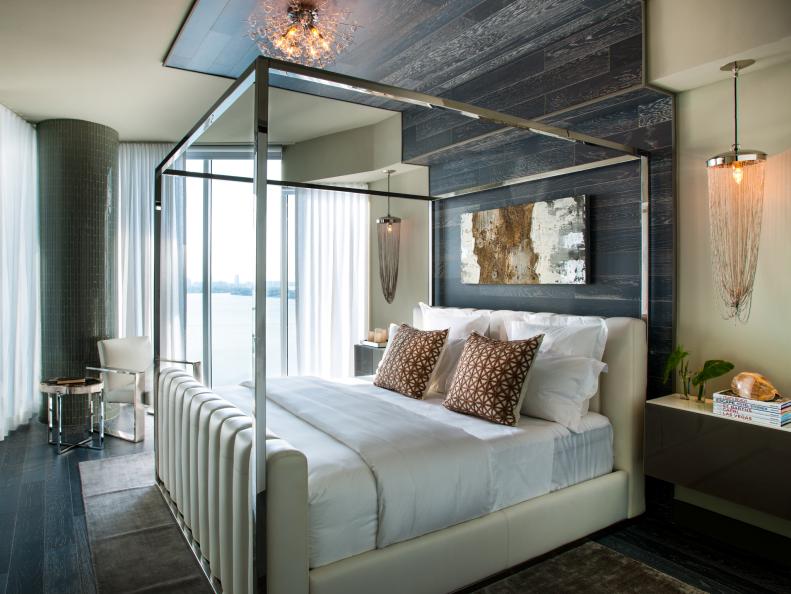 Neutral Contemporary Bedroom With Gray Wood Backdrop and White Linens