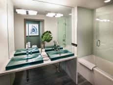 Deep Teal Sinks Stand Out in Modern Bathroom
