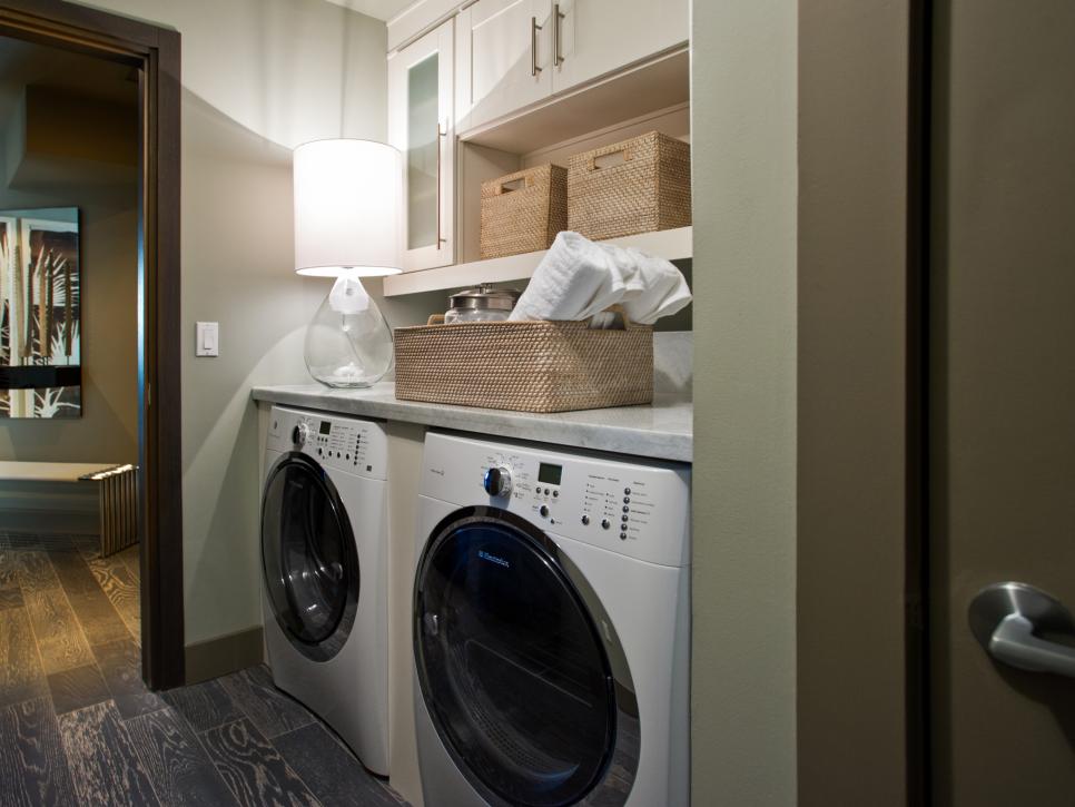 Laundry Room with White Cabinets and Wicker Baskets