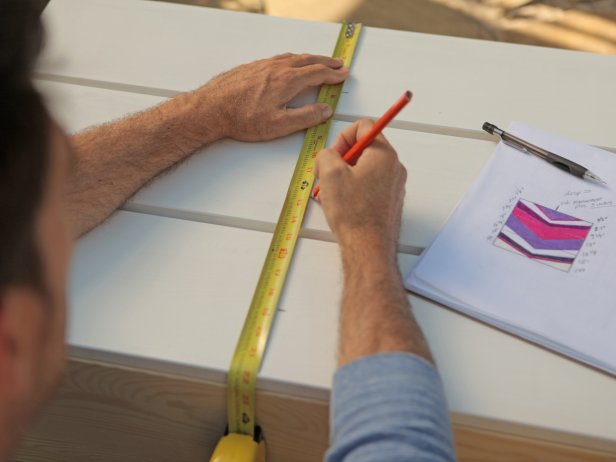 When choosing chests of drawers to give a chevron makeover, stick with styles that have smooth, flat drawer fronts. Using an electric sander, sanding pads and an extension cord, remove existing finishes from stained or painted wood. In order to ensure the best finish, add two coats of either primer or a base color to the chest of drawers using a paint roller. Then sketch your design with a carpenter’s pencil. Outline your design with painter’s tape, and then apply colorful paint. Repeat until all chevrons have been painted. Seal drawer fronts with a coat of sealant.