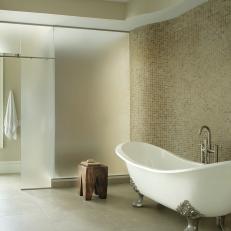 Picturesque Soaking Tub With Mosaic Tile Wall 