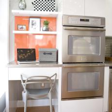 Contemporary Kitchen Office Nook with Orange Wall