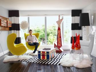 Black and White Condo with Yellow Chairs. 